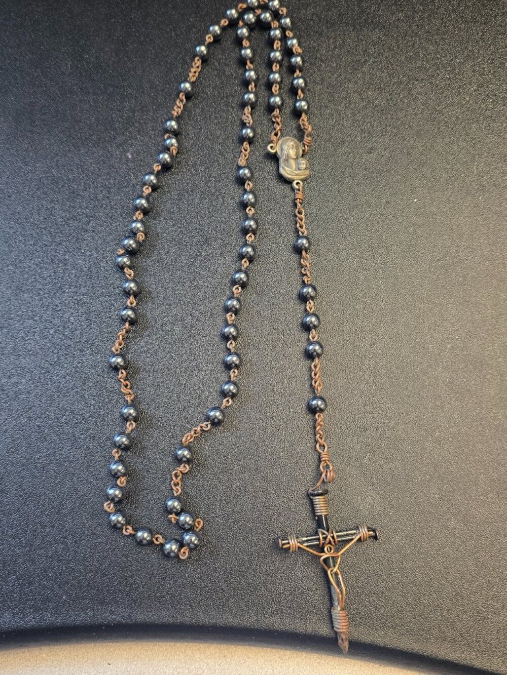 Rosary Beads with Polished Hematite and Nails as the Cross